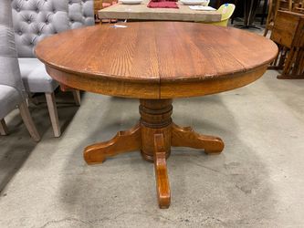 Round Wooden Pedestal Dining Table