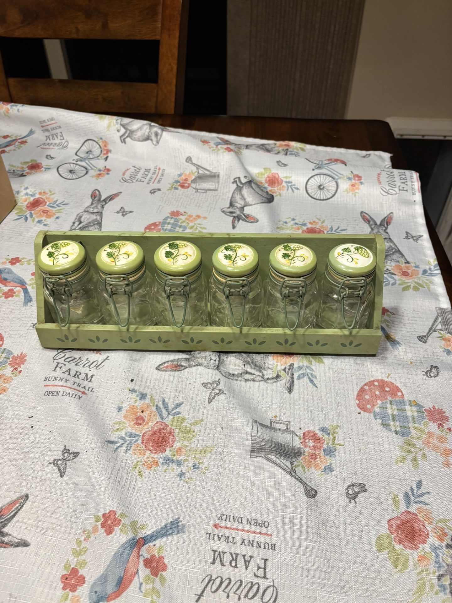 Vintage spice jars with metal rack