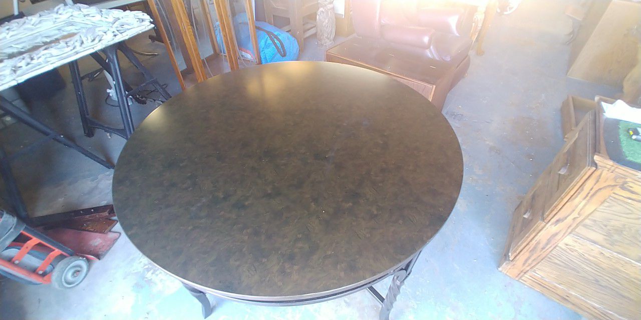 Price Reduced...surface scratches..Round breakfast nook table