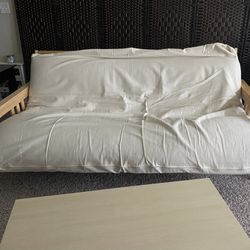 Futon Couch Full Bed And Coffee Table Blond
