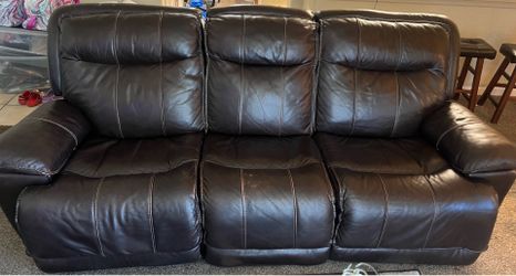 Brown leather reclining couch and loveseat in great condition