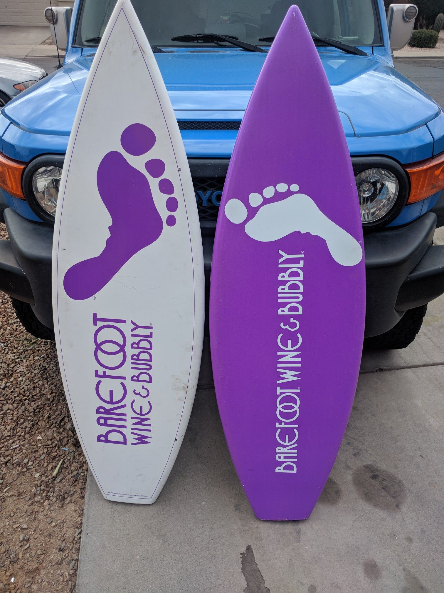 Barefoot wine display surfboards