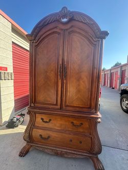 Ornate Wood Armoire with Drawers