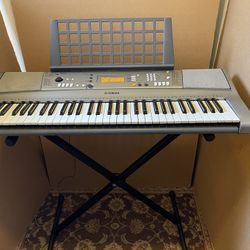 Yamaha YPT-310 Keyboard With AC Adaptor And Stand In Working Condition $100 Firm On Price