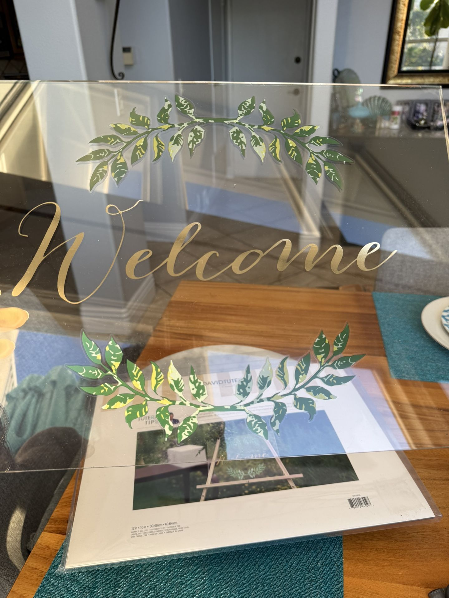 An Acrylic  “WELCOME” Sign