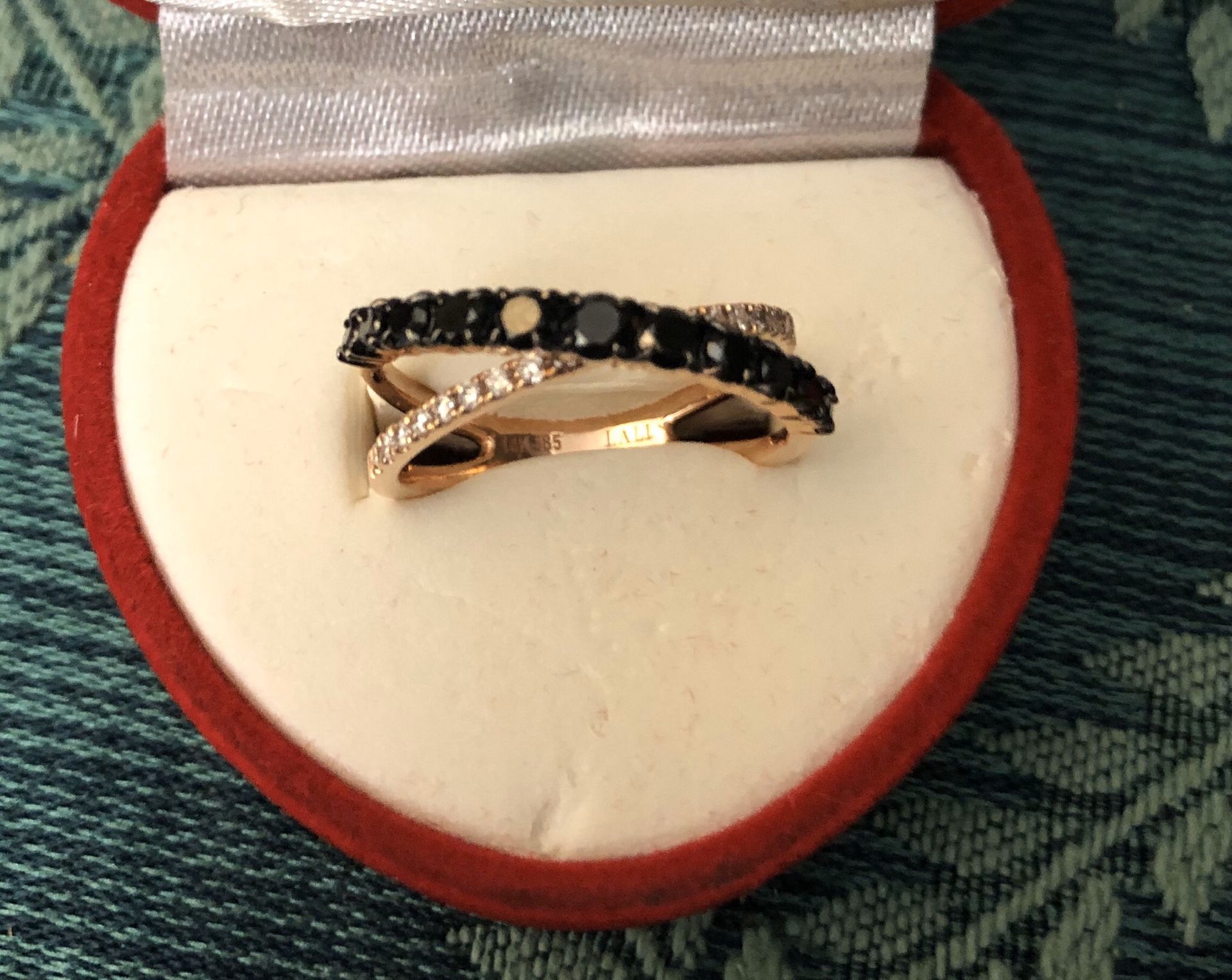 14k gold with white and black diamonds