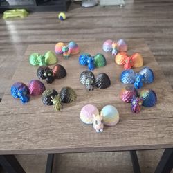 Baby Dragons And Their Eggs