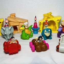 9 piece lot Vintage 1993 Flintstone meal toys from Mc Donald’s