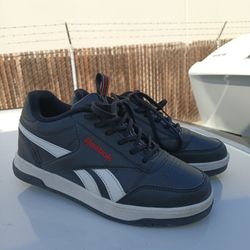 size 5.5 youth , Reebok with Heely's skate wheels (brand new)