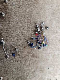 Lot of belly rings. Over 30 pieces.