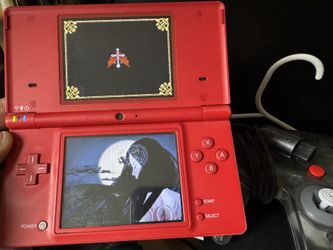 Red Nintendo Dsi , Connects To The Internet .  