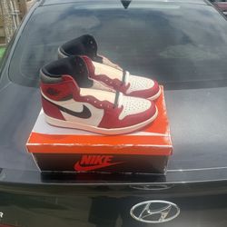 Air Jordan Retro 1 High OG Chicago Lost And Found 