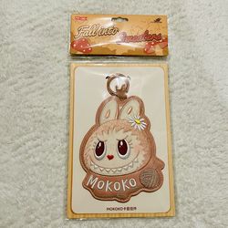 pop land fall into sweaters mokoko card holder pendant