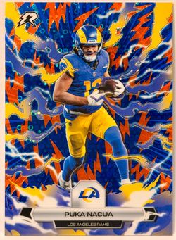 Puka Nacua • 2025 Topps Resurgence • Blue & Orange Spark Refractor • #58