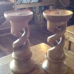 Pair of burrow wood carved candle stands