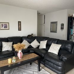 Black Leather Couch With Coffee And Side Table 