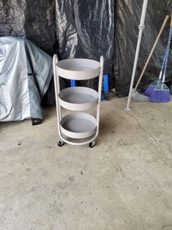 Gray cart on wheels in excellent condition