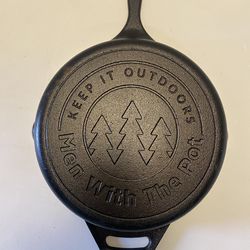 sits flat, no wobble Cast-iron skillet- Men with the pot- keep it outdoors, sits flat, no wobble