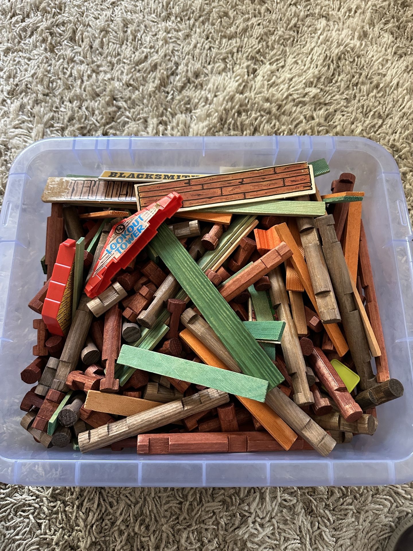 Lincoln Logs and plastic box - several hundred