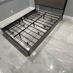 Queen bed frame with two luggage racks