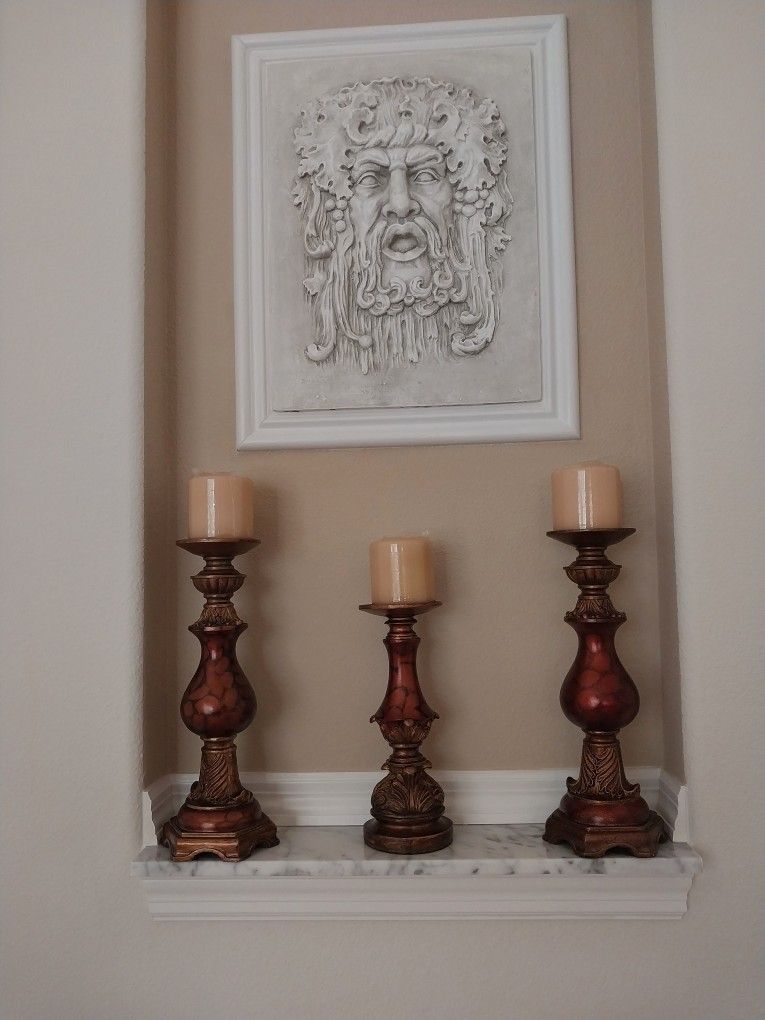 Three Candle Holders And Candles