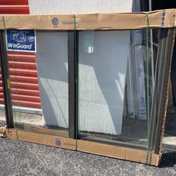 PGT 57 3/4x47 1/4 IMPACT WINDOW HORIZONTAL SLIDER BRONZE