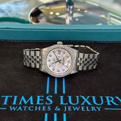 Rolex Datejust with a diamond bezel and mother-of-pearl dial(Price Discounted From Original Price)