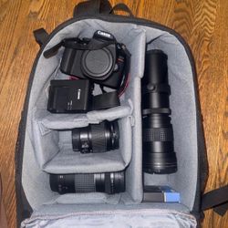 Canon EOS Rebel T7 camera with lenses and accessories