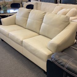 New Ashley Ivory Leather Sofa Clearance $950. Was $1999