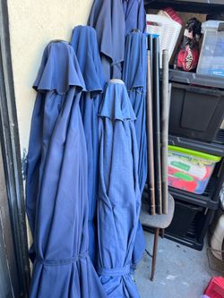 Large patio umbrellas in good condition