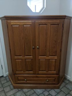 Solid oak entrainment center