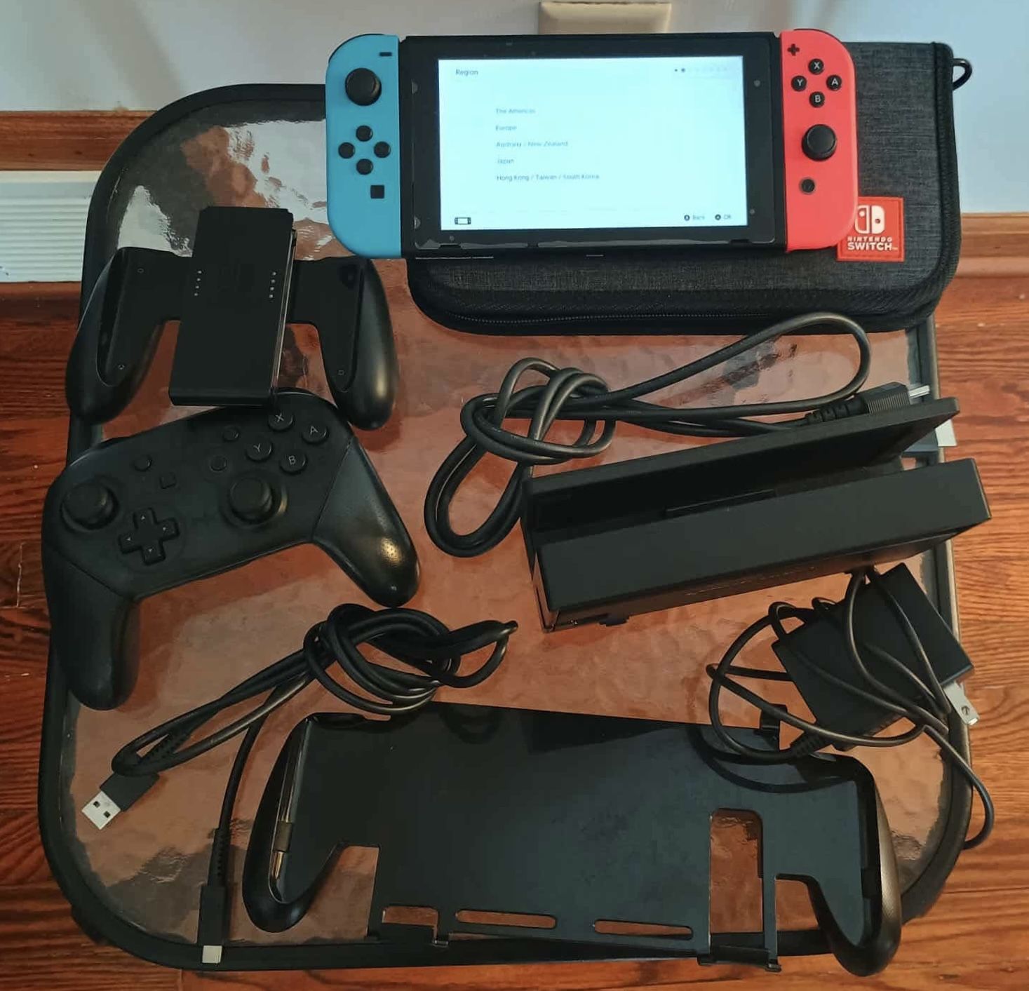 Nintendo Switch V2 Console with Neon Red and Neon Blue Joy-Con Case & Pro Controller