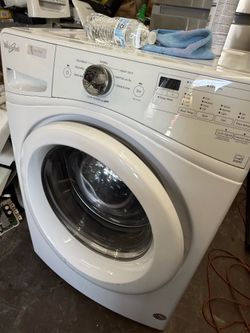 Whirpool white front load washer and gas dryer