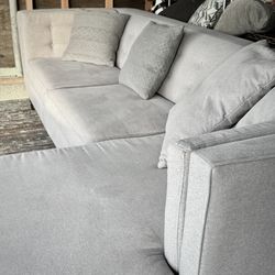 Light Gray Tufted Tightback Sectional Sofa with Right-Facing Chaise