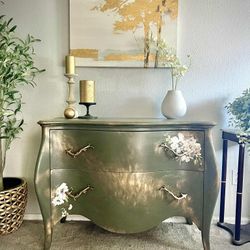 Sage green Bombay dresser / French provincial with gold highlights, and floral transfers
