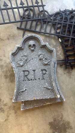 Two foam headstones, and five piece pieces of fencing Halloween