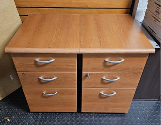 Selling two (2) wood cabinet with 3 storage drawer