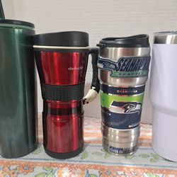        4 Cups 2 Starbucks One Seahawks   "$10.00 Good Condition. 