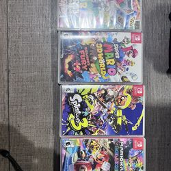 Nintendo switch with games, extra pair of controllers, and carrying case