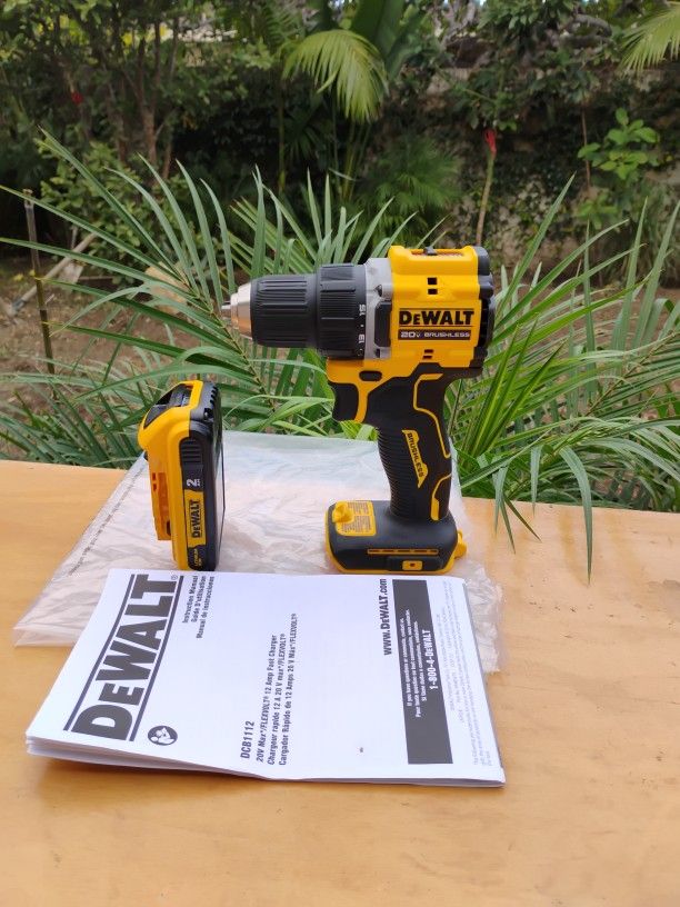 DeWalt. 20 V. New. Atomic.  Drill Driver.   1/2".  W/.  Battery.   2.0 AH. Lithium    