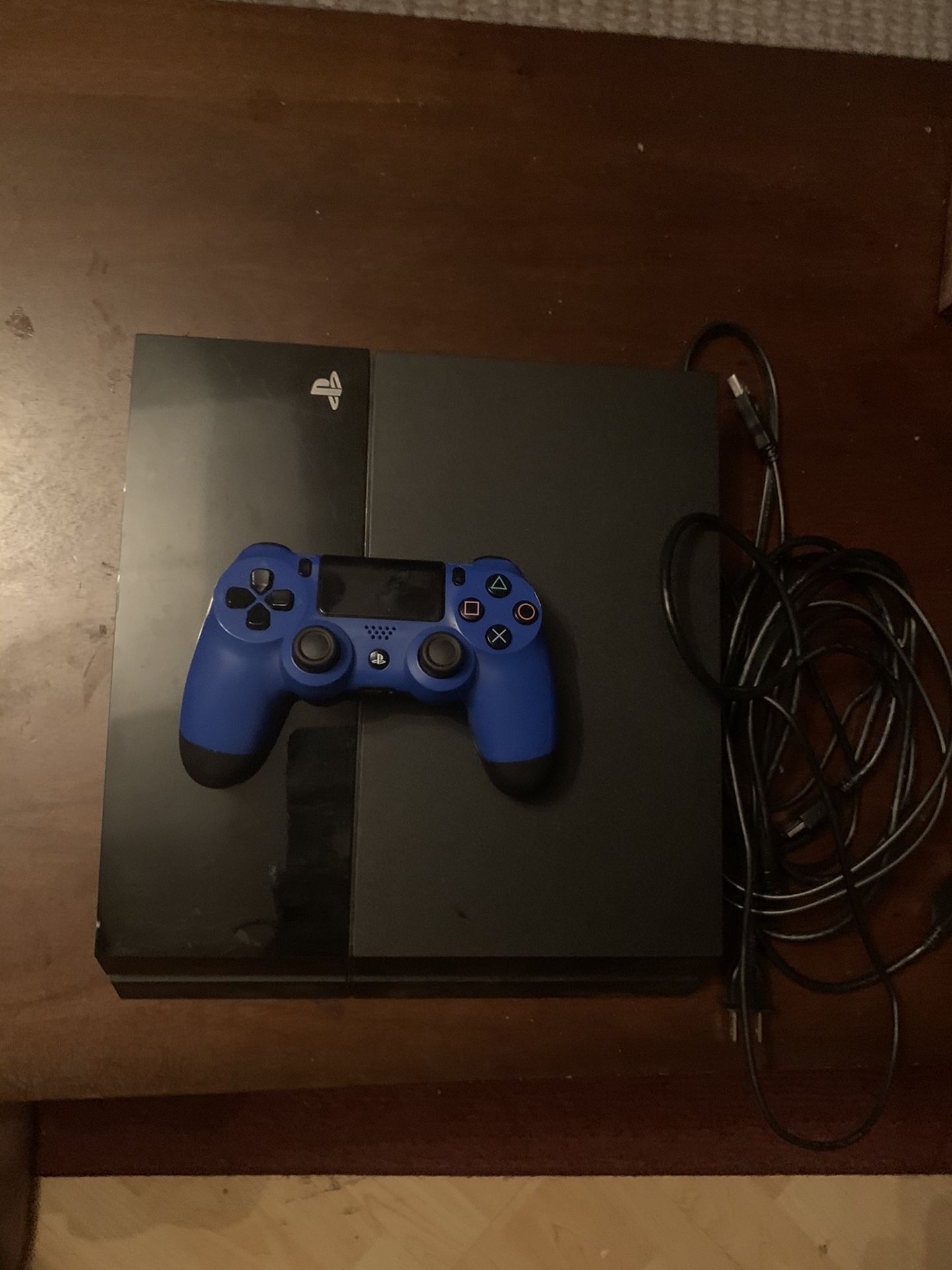 Sony PlayStation 4 with all cords and one controller