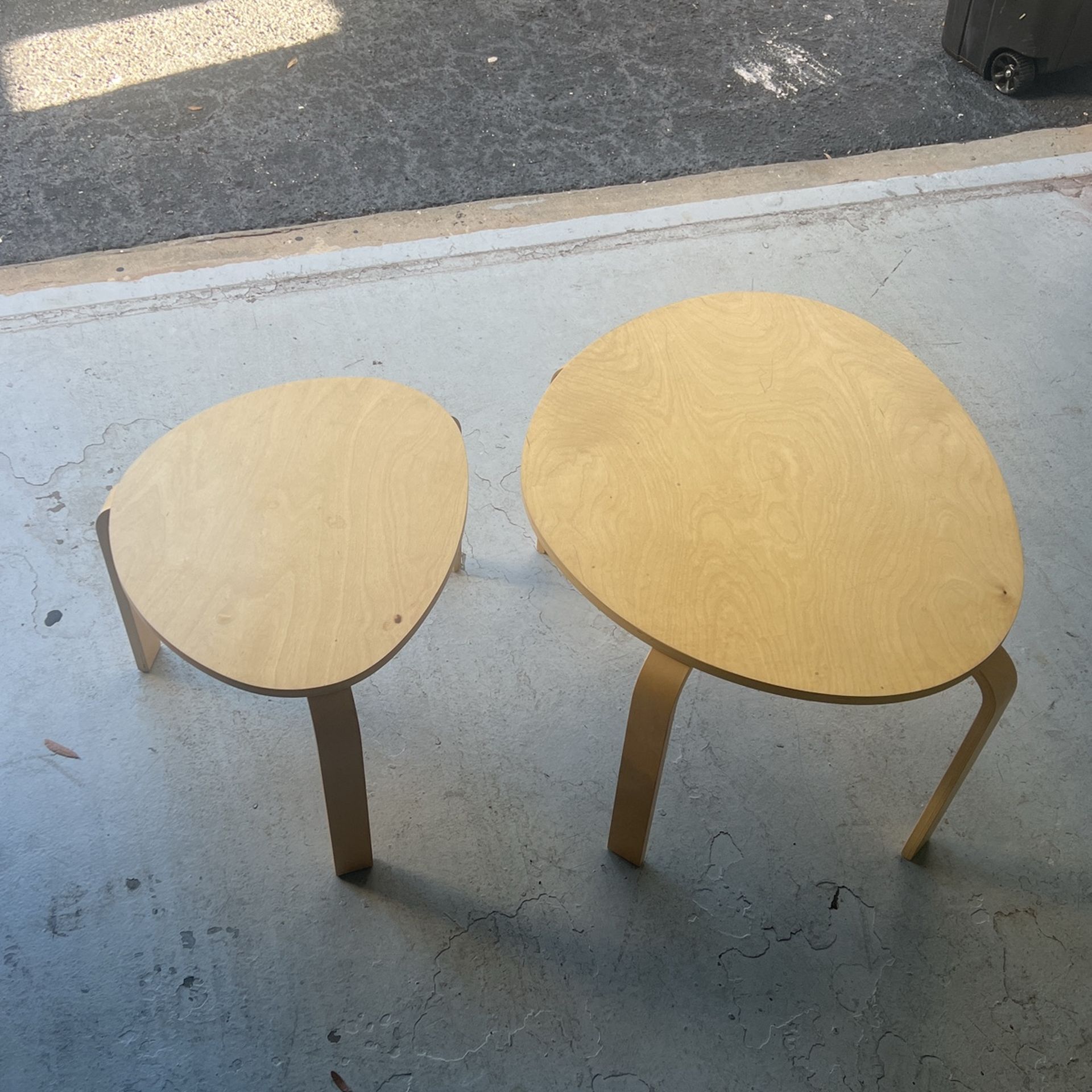 nest of tables in birch veneer.