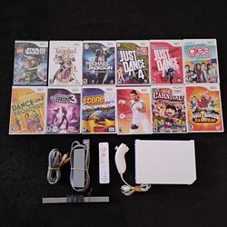 Nintendo WII with 12 WII Games