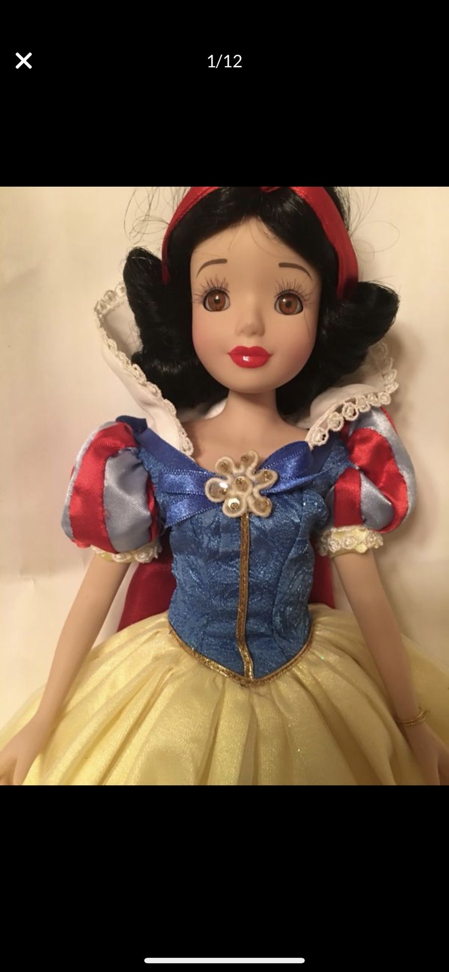 Snow White porcelain doll. Real eye lashes