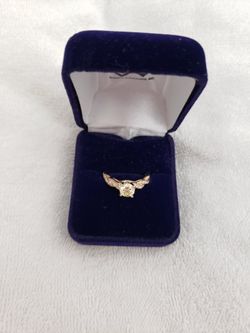 . 94 Very Good/Very Good, Yellow Diamond. 14K Gold Band With White Diamonds. Comes With Papers! .