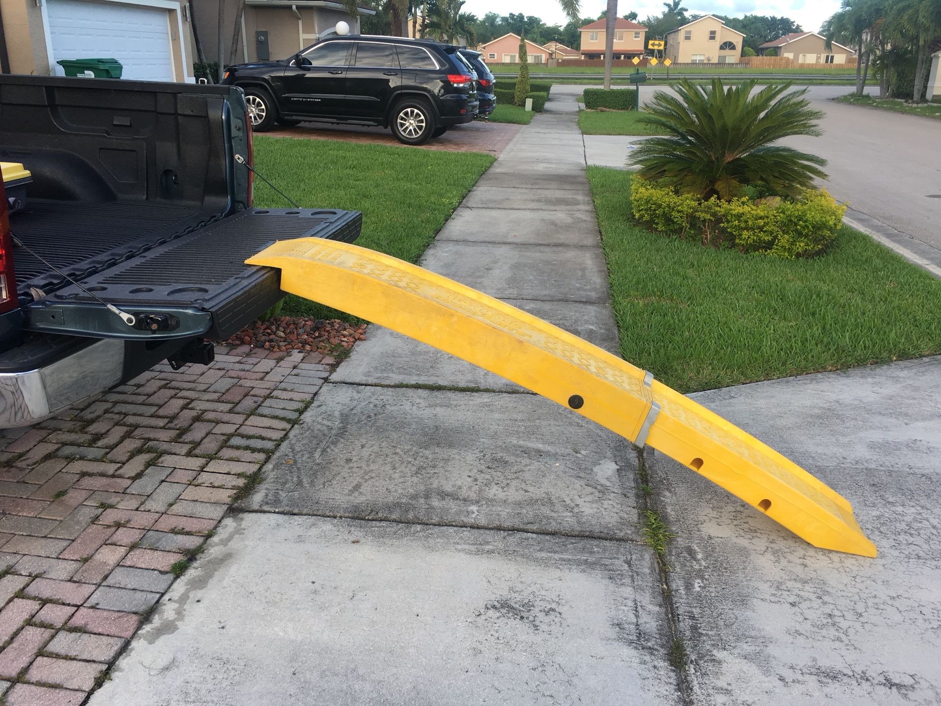 Plastic-Motorcycle Telescopic Ramp. Highland Ramp Arts. Max Load not to Exceed 750 Lbs