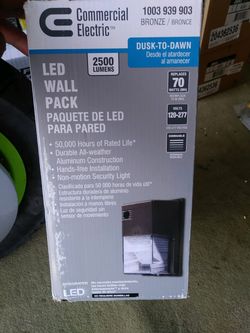 Commercial electric LED wall pack 2500 lumens. Dusk to dawn