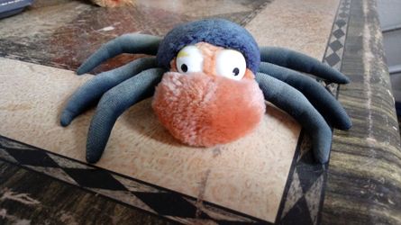 Stuffed cloth spider.