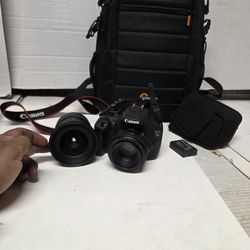 Canon Eos Rebel ds126491  2 lens and backpack