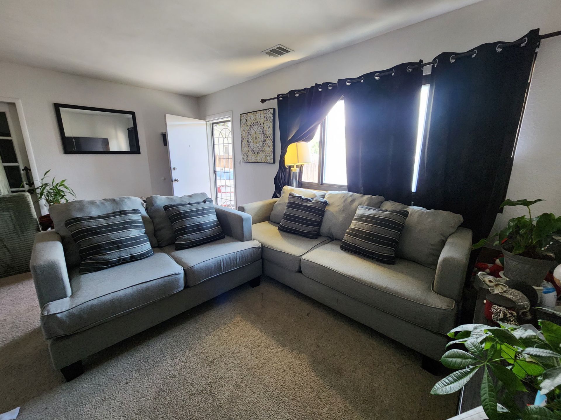 Grey fabric sofa and loveseat set